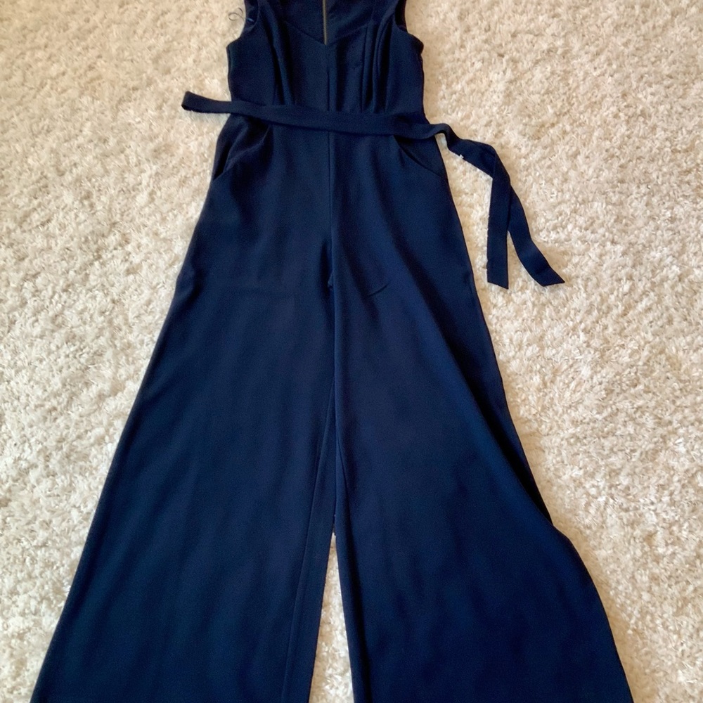 Gabby Skye navy jump suit. Size 6.